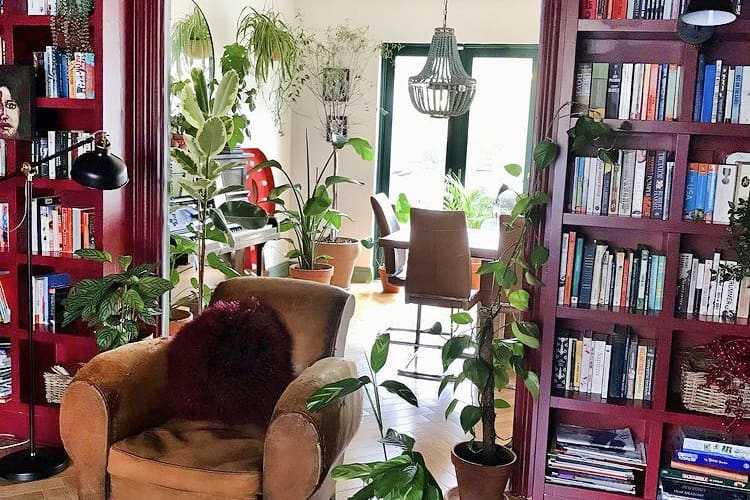 A Beautiful Irish House Has Incredible Bold Burgundy Bookshelves